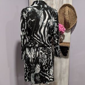 Chico's Dresses - Chico's animal print, wrap top, 3/4 sleeve dress Chico's Dresses - Chico's animal print, wrap top, 3/4 sleeve dress